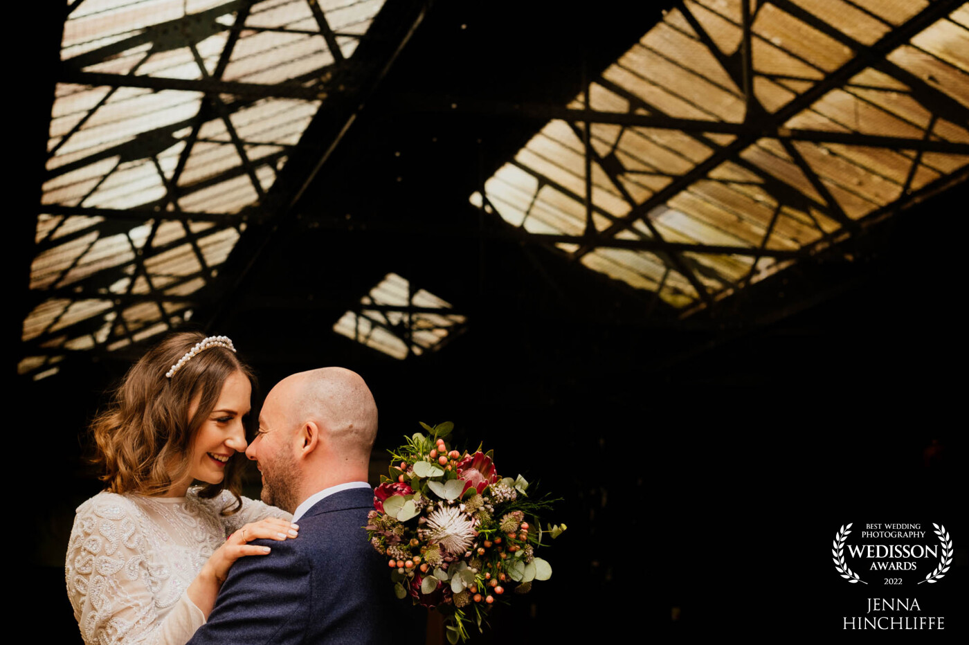 I wanted to make my couple pop against a dark background but still include the industrial features of the venue so I used the roof to add interest and draw your eye to the couple.