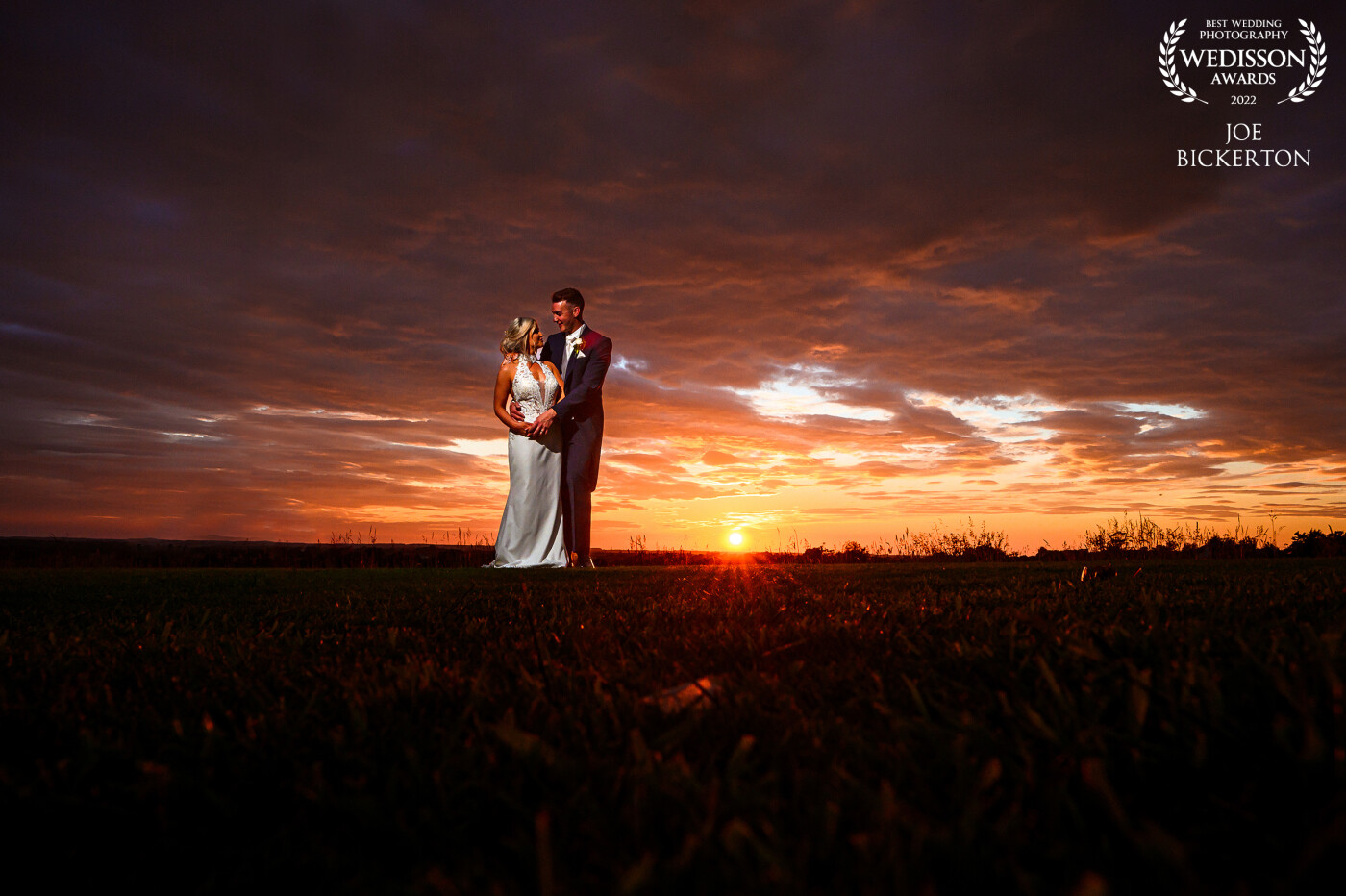 This couple shot was taken at the West Tower in Lancashire.  It was one of those summer evenings in June 2022 where the sun emerged from the clouds and hit the horizon well after the first dance - and gave us about 7-8 minutes before it disappeared! Using a simple OCF at 1/2 power to light the couple, shooting at F16, 200s.