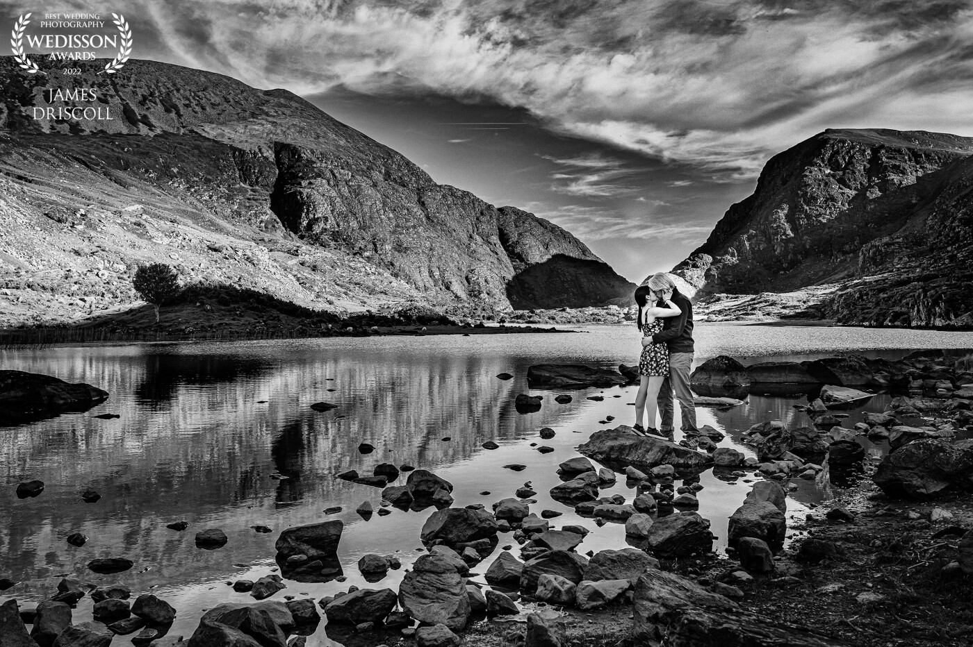 Suprise Enagement at the iconic Gap of dunloe in County Kerry. <br />
Waiting on the wishing bridge with no cover I was moments before the couple arrived. Managed to talk to motorcyclists into stopping and just start chatting with me as i told them the story of what was going down.  The couple arrived and once down on bended knee the camera came out from behind my jacket, and we went from there..