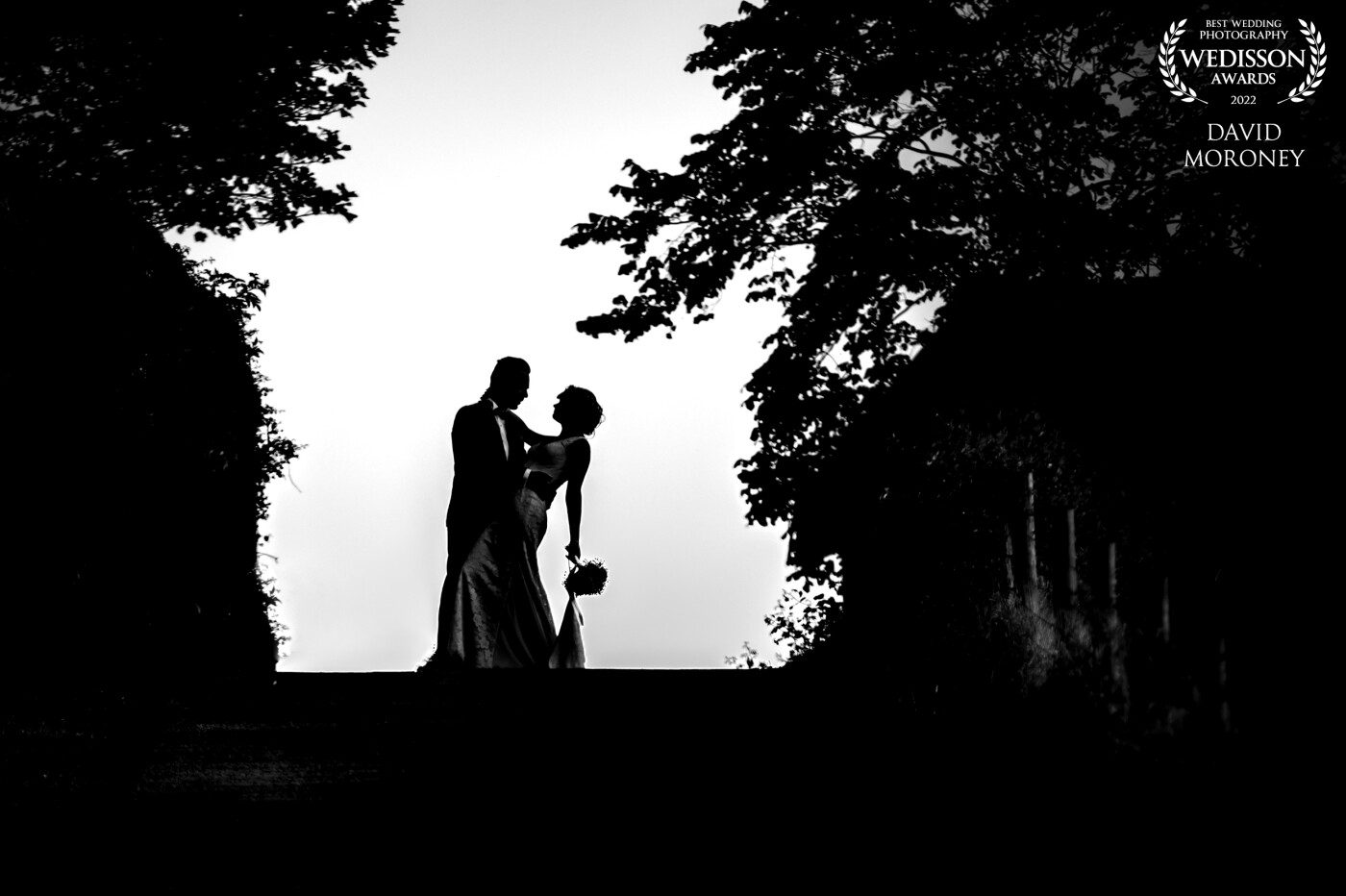 Jowita & Mihai's wedding was an intimate celebration at Stepney hill farm, Scarborough. We had just finished doing the couple shots in the nearby countryside and they decided to walk back to the venue up the hill. As I was packing up some equipment I glanced up and saw the sillouette, I shouted for them to stop for a second.. without any prompting Mihai threw Jowita back in his arms and I took the shot.