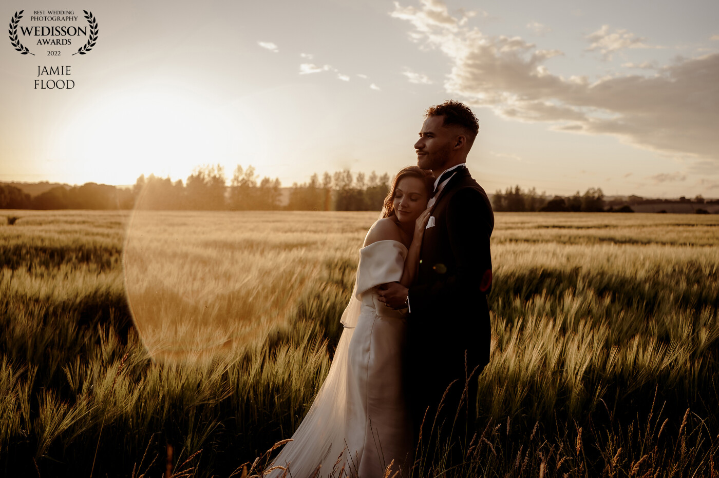 Sunset at Cherelle and Carlton’s gorgeous wedding in Farnham, Surrey <br />
<br />
Just one hour before the clouds had opened up and soaked the venue before giving way to this beautiful light