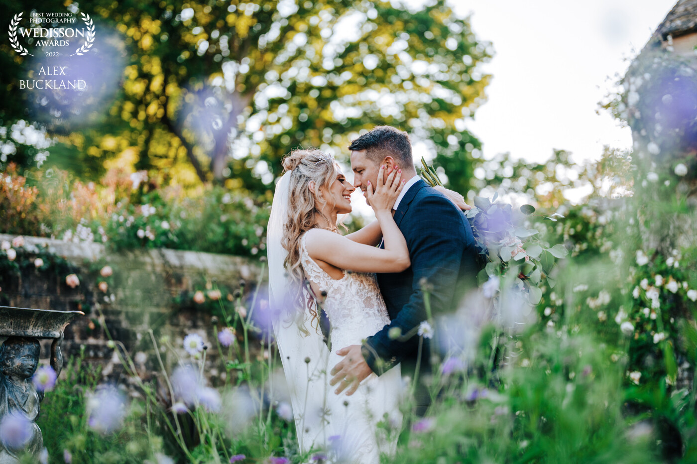 This was captured using my new 50mm 1.2, whilst capturing this couples portrait session, I noticed some wonderful flowers with beautiful colours in the venues gardens which I knew would work as great foreground bokeh. I asked the couple to get close and intimate with one another and this wonderful moment was captured!