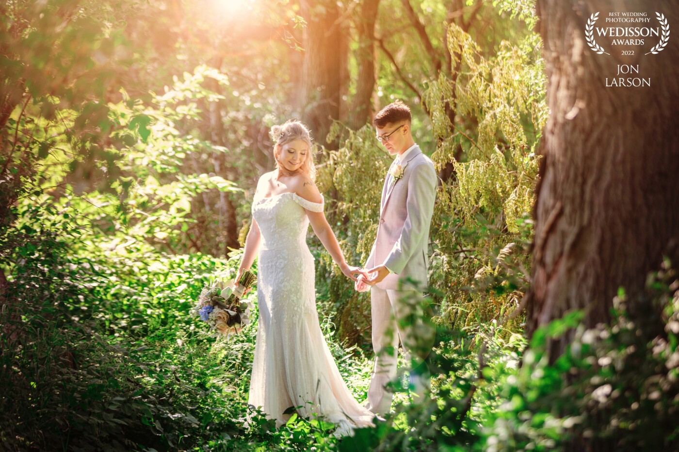 With a path worn out, I asked Ben and Miranda to go play in the light that was piercing through the trees at the end of this magical area.<br />
Asking the bride and groom to have a moment together….This is what they gave me. It was one of those goosebump moments knowing I had just captured something special!