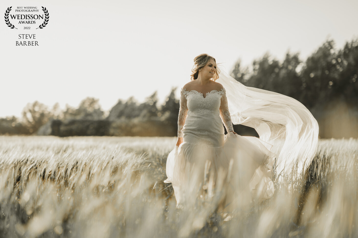 Golden hour always delivers! This shot was one of a few bridal portraits taken in that good light, I just happened to get lucky enough for a gust of wind to blow the veil to complete this image.