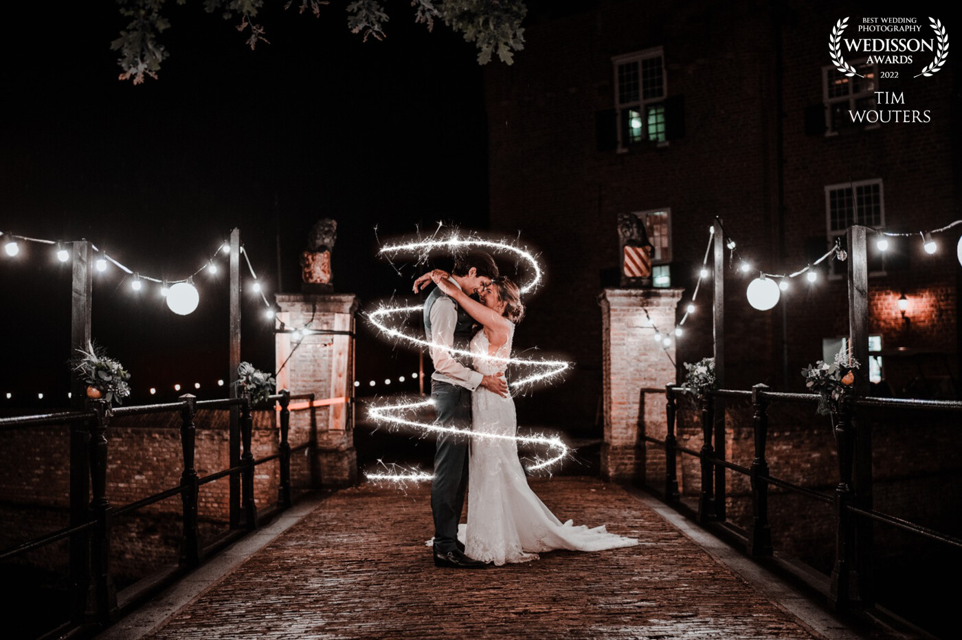 We love to get creative with our couples! When this couple wanted to go out in the dark and create something cool we didnt hesitate for one second. Using ambient light from the decorartion on the bridge we had just enough light to set right mood!