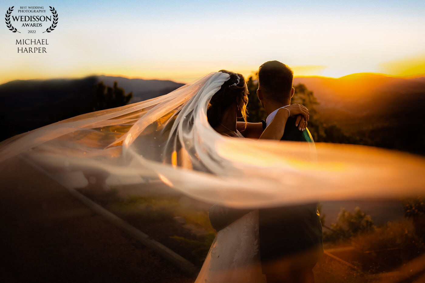 Captured at sunset in the hills of Tuscany this beautiful shot was timed as the sunset. Waiting for the perfect breeze the veil was held in such a way that it almost disappears in the foreground creating a softening effect.