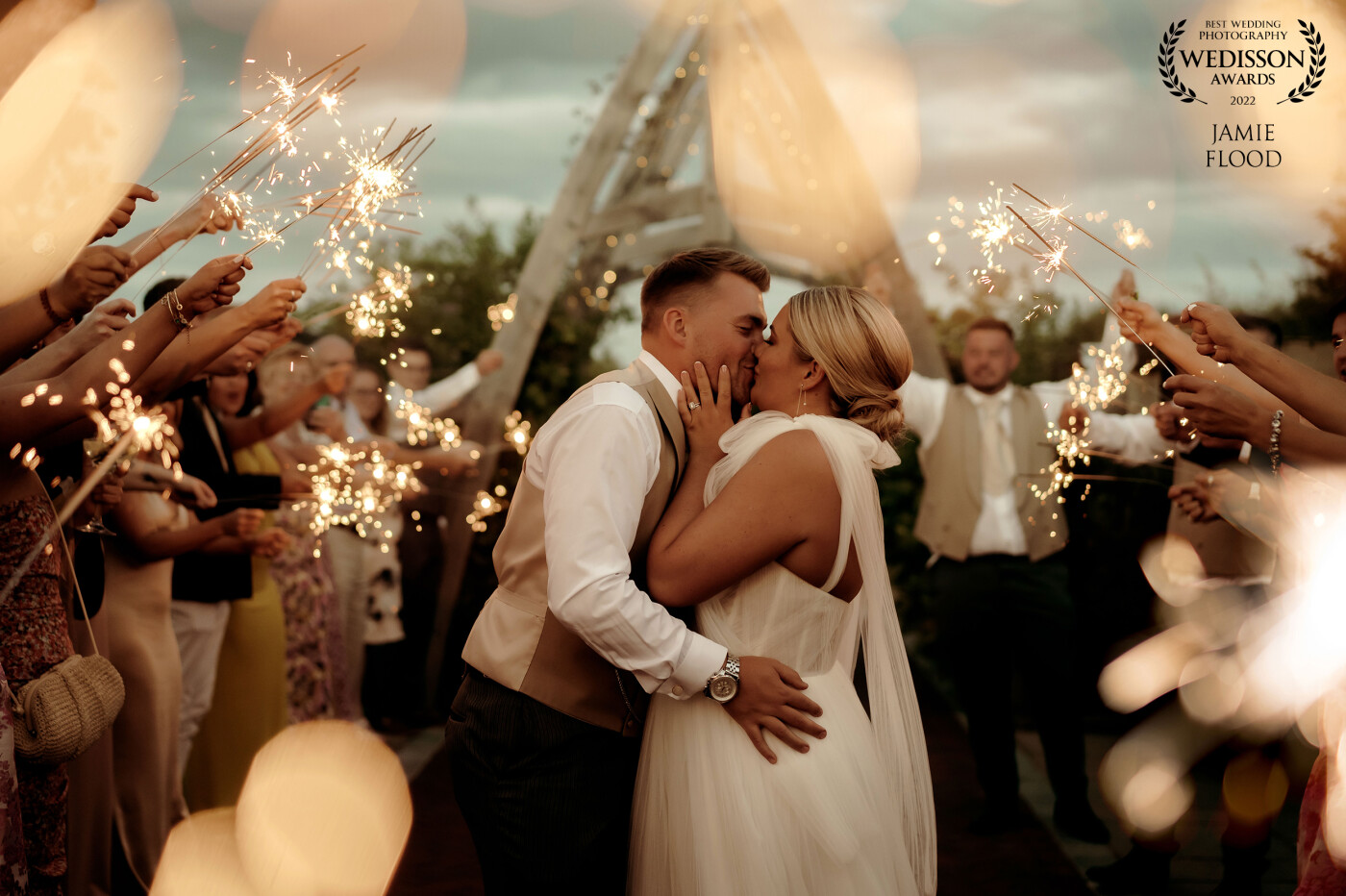 The Prices enjoying a kiss during their sparkler exit. Sparkler exits are always a favourite of mine to end my day at a wedding. They had a beautiful day full of both smiles and tears!