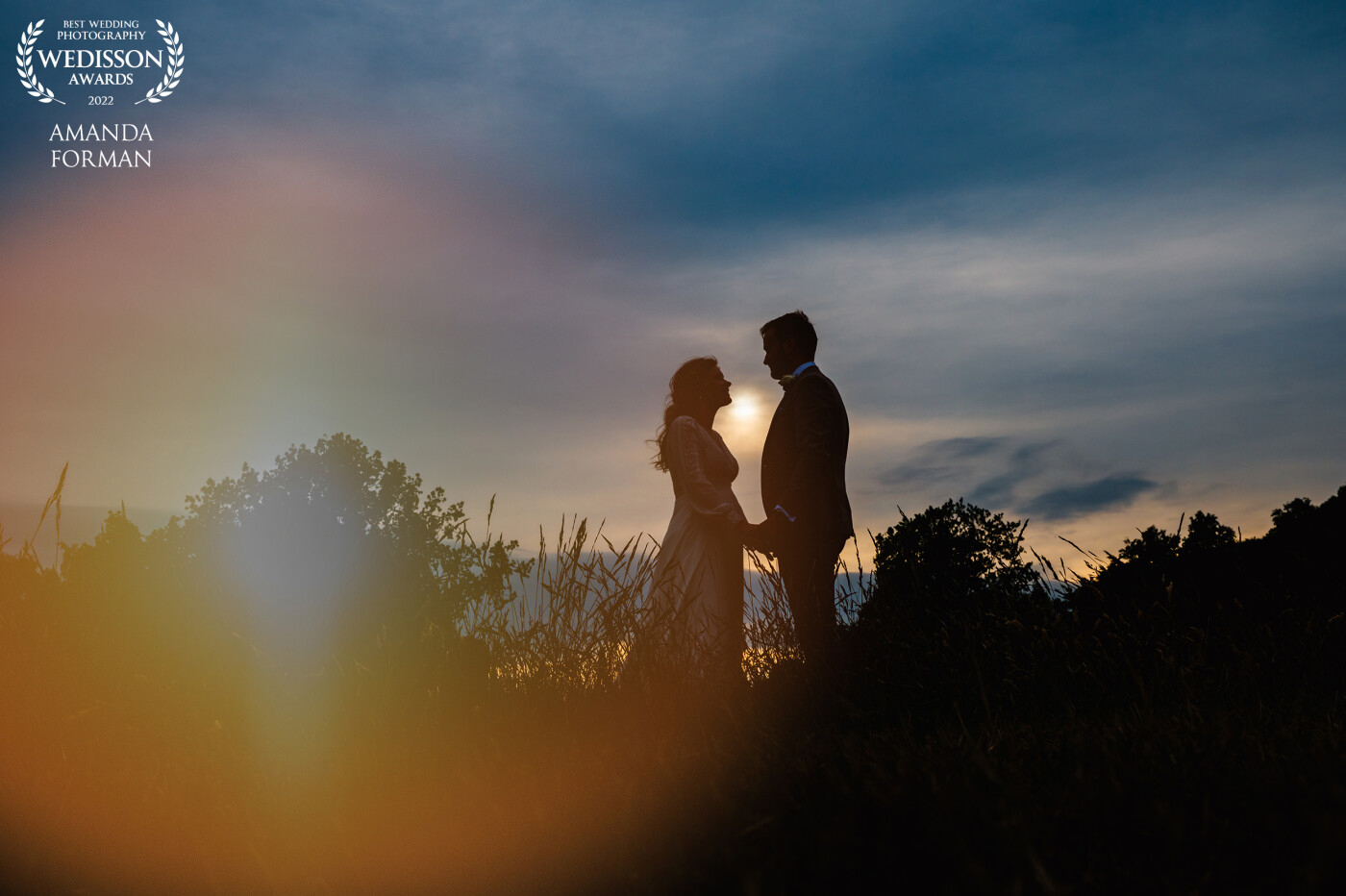This photo was taken with only minutes to spare. The sky was so cloudy but we had a minute or two where the sun just popped between the clouds as it was setting. One of my favourite weddings of the year so I am so happy to have an award for one of their images.