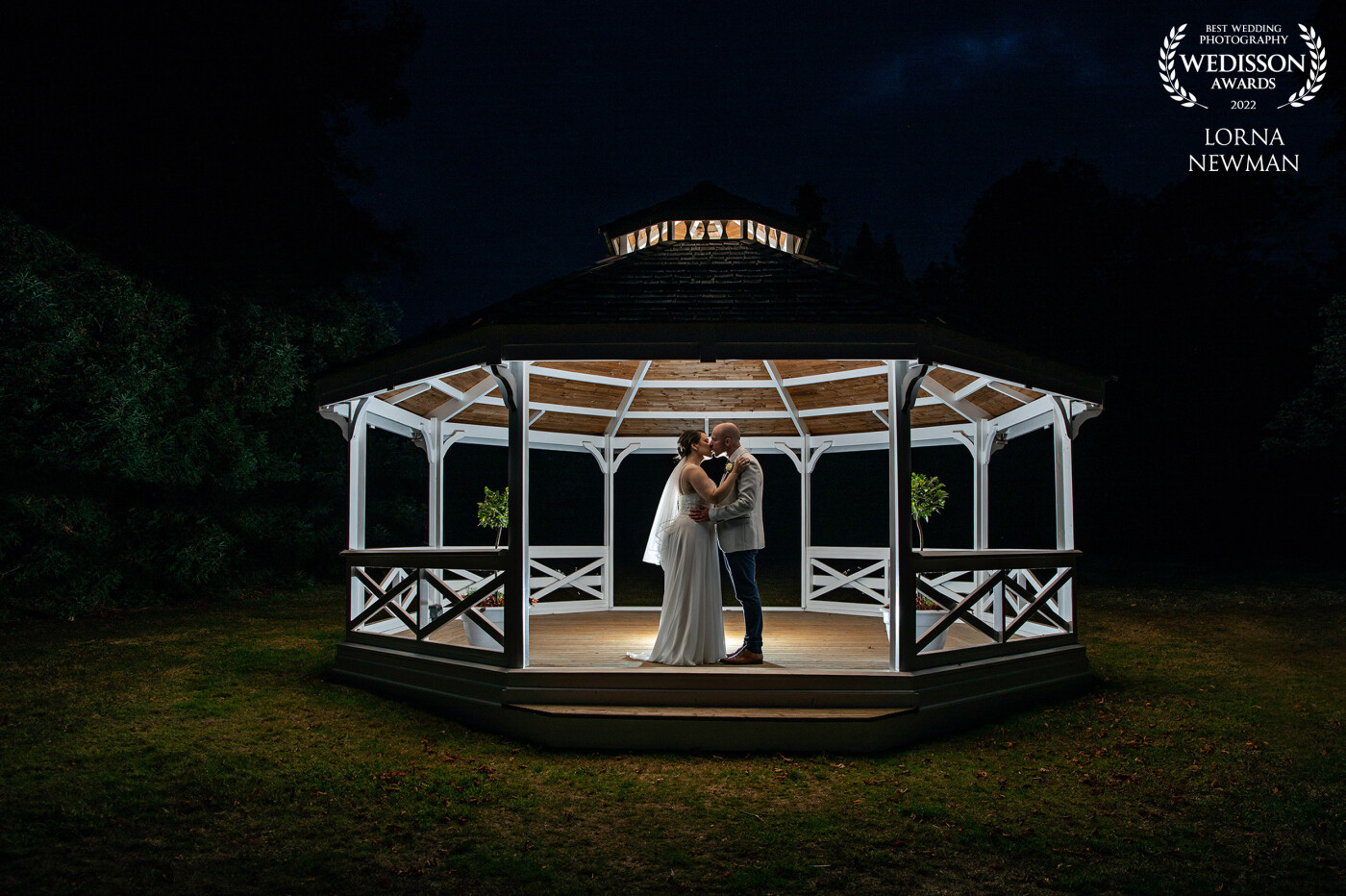 A shot from Nathalie & Stephen’s beautiful wedding at Holmewood Hall in Cambridgeshire. We took advantage of the darker evenings to create this moment between them.
