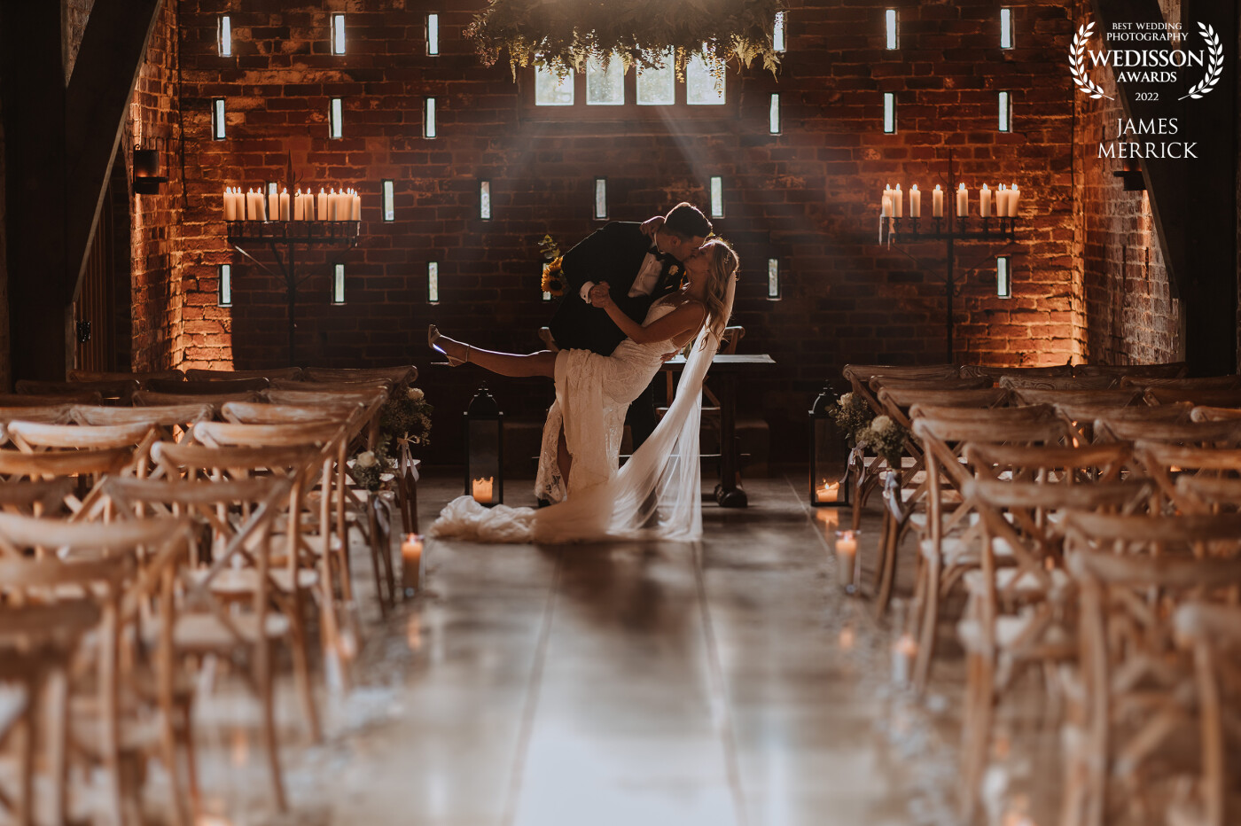 A classic kiss with Hollie & Callum in the main ceremony room at Grangefields in Derbyshire. The natural light pouring in through the windows was a huge bonus!