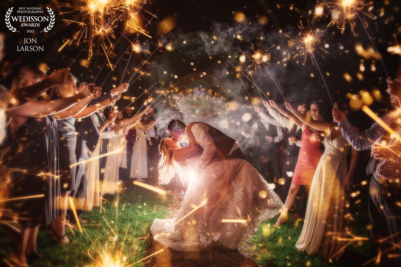 Taking this photo was just as exciting as it looks! Having Marycate and Geoff along with some of their closest family and friends come outside of the tent and line up. Sparklers were then lite and the bride and groom gave a slight run to the middle and the groom did a perfect dip with his new wife Marycate! I had the guest flood in around them and my camera to create this super fun moment!!
