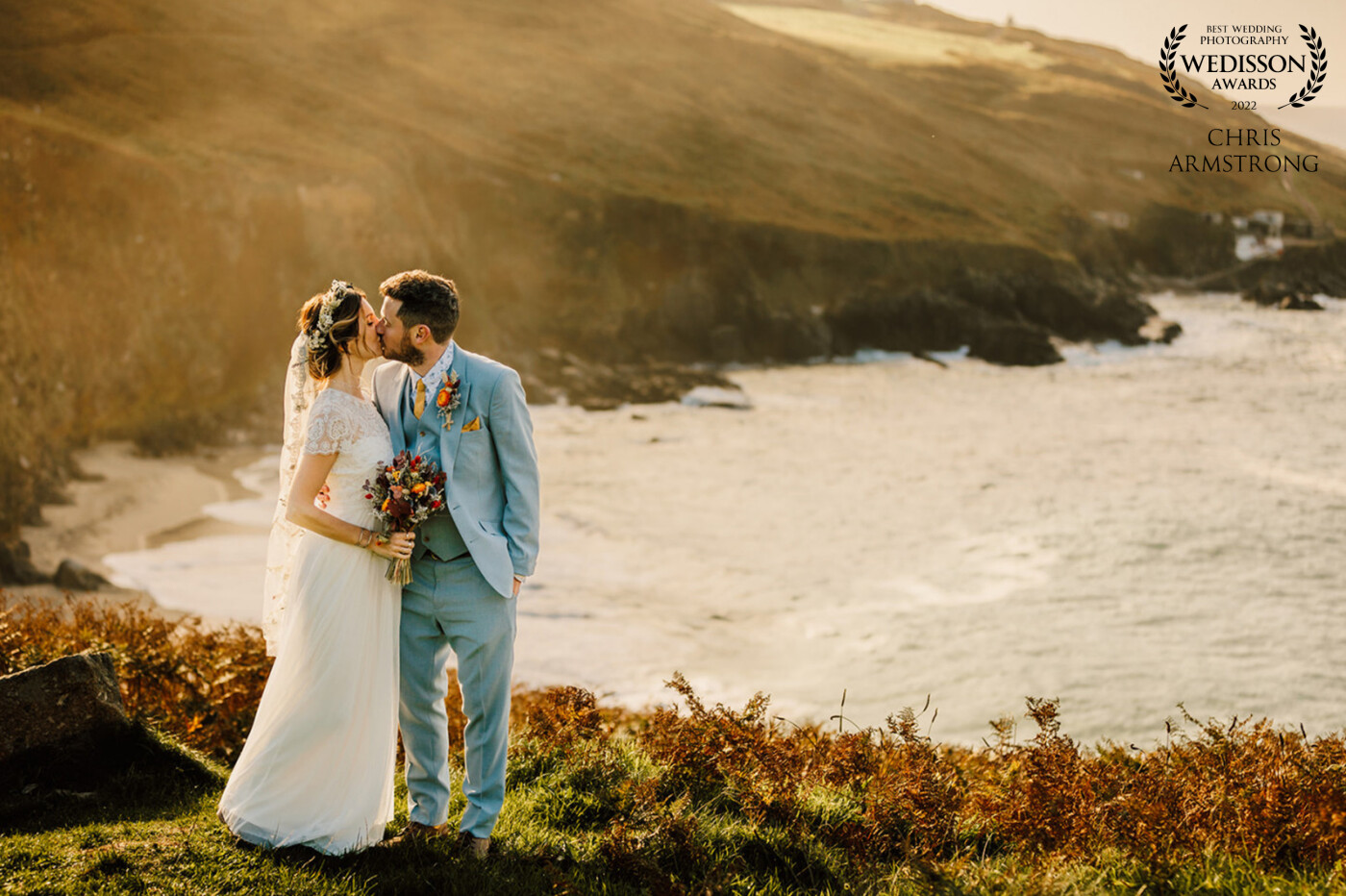 Andy and Maisie chose the Wild West coast of Cornwall for their autumnal wedding day at Chypraze Wedding Barn. There is a beautiful sea cove about. 15 minute downhill walk from the venue, not for the fainthearted especially in a wedding dress! But we (and about 30 guests) embraced the cliffside descent and it was definitely worth it. I love the light and autumnal colours next to the sea!