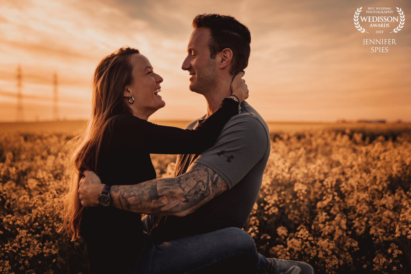 Romantic couple shooting at sunset in the glowing rapeseed field. We love capturing those special moments with the perfect backdrop and beautiful golden light.