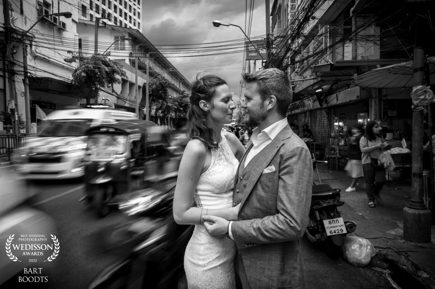 In the middle of Bangkok, we created this image just standing in the middle of the road. <br />
The busy life went on, while the couple enjoyed their love.