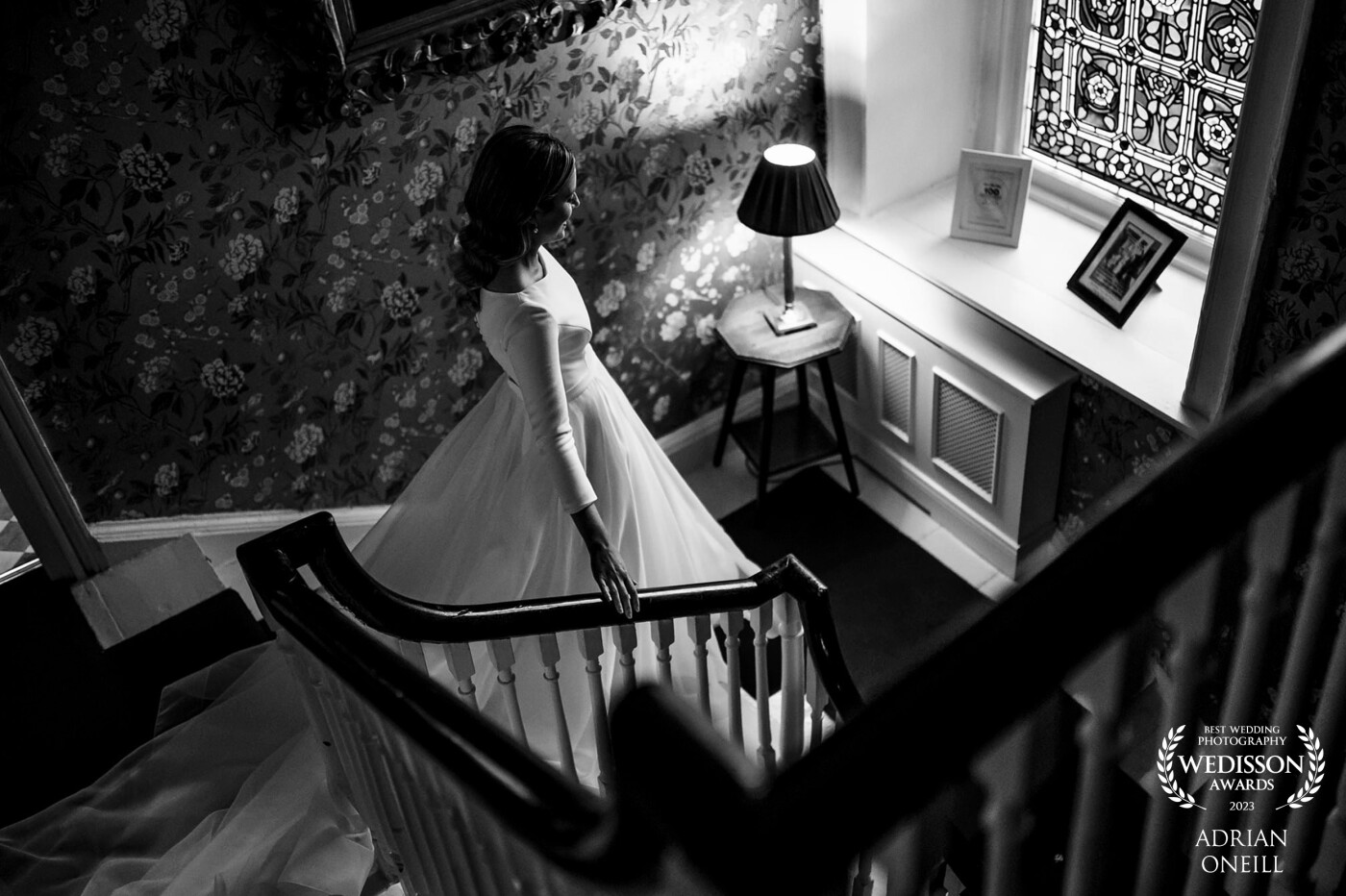 The bride on her way down the stairs to the ceremony...I love her beautiful smile and I wanted to capture this with her knowing. I just love these real moments