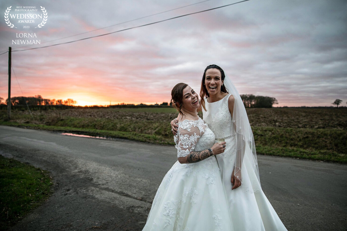 A Shot of Jessica & Racheal togther just as the sun was setting on their beautiful winter wedding day in Essex, UK.