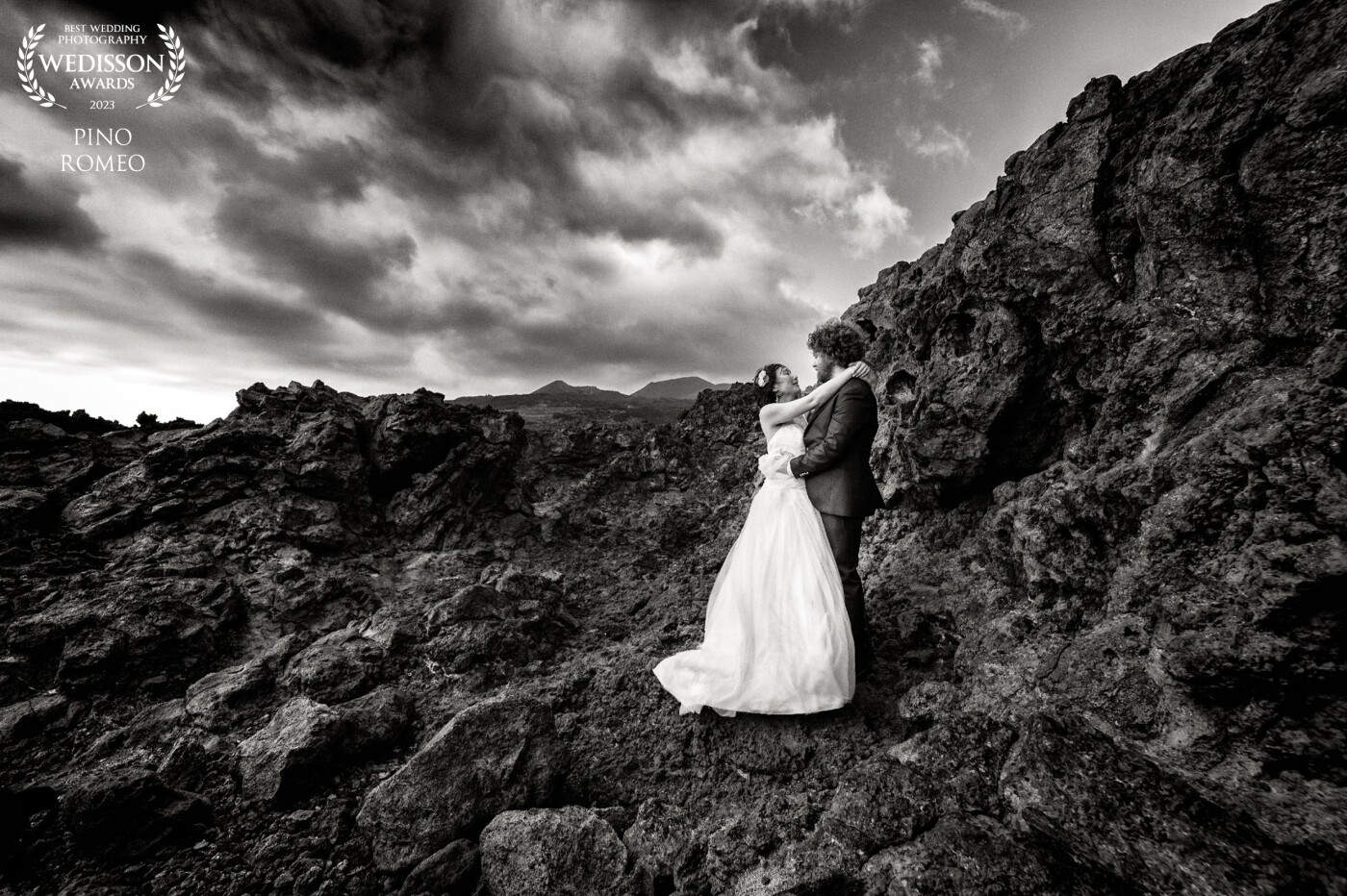 A post wedding portrait session of Joan and Bastien on the island of La Palma, Canary Islands.  The cooled lava field in the south of the island is a very inspiring lunar setting for a black and white rendering.  This is the 6th photo from the same portrait session in La Palma Island to receive an award... it's just crazy!