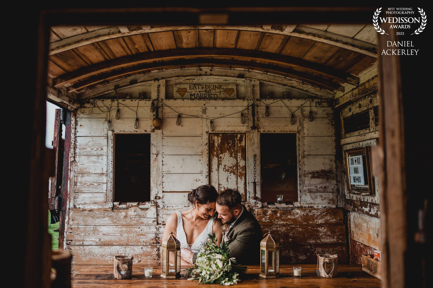 This was a really sweet moment in Sophies back garden during her wedding to Mark, her father had found these amazing old train carriages on eBay, so he bought them and renovated them to use as a summer houses in their garden so we used them as a cool backdrop for some portraits.