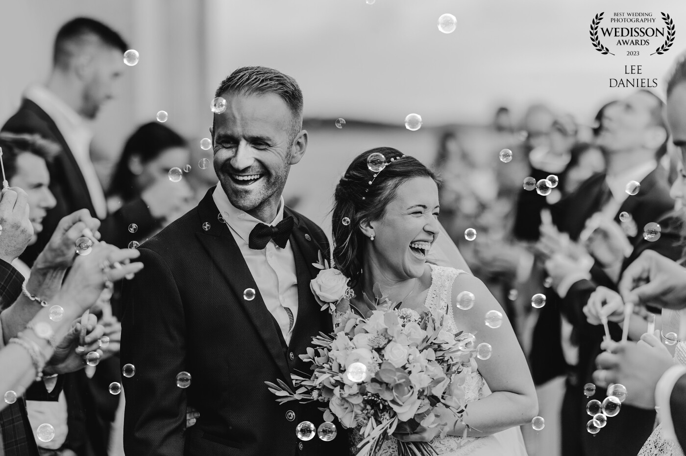 There's a few venues that don't allow confetti, so bubbles are a great shout. I love this fun filled image of Lizzie & James at Normanton Church in Rutland
