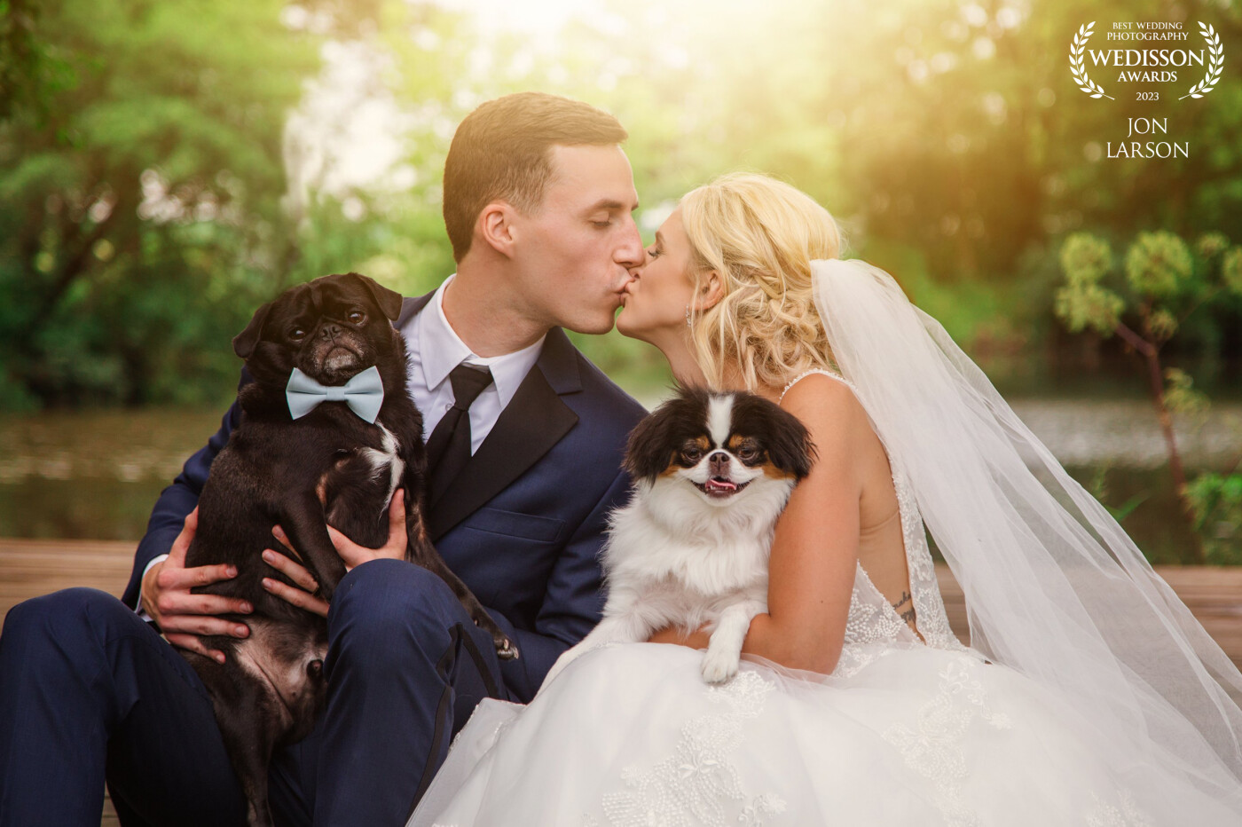 Jon and Lauren enjoying each other and a moment with their pups just after their ceremony.