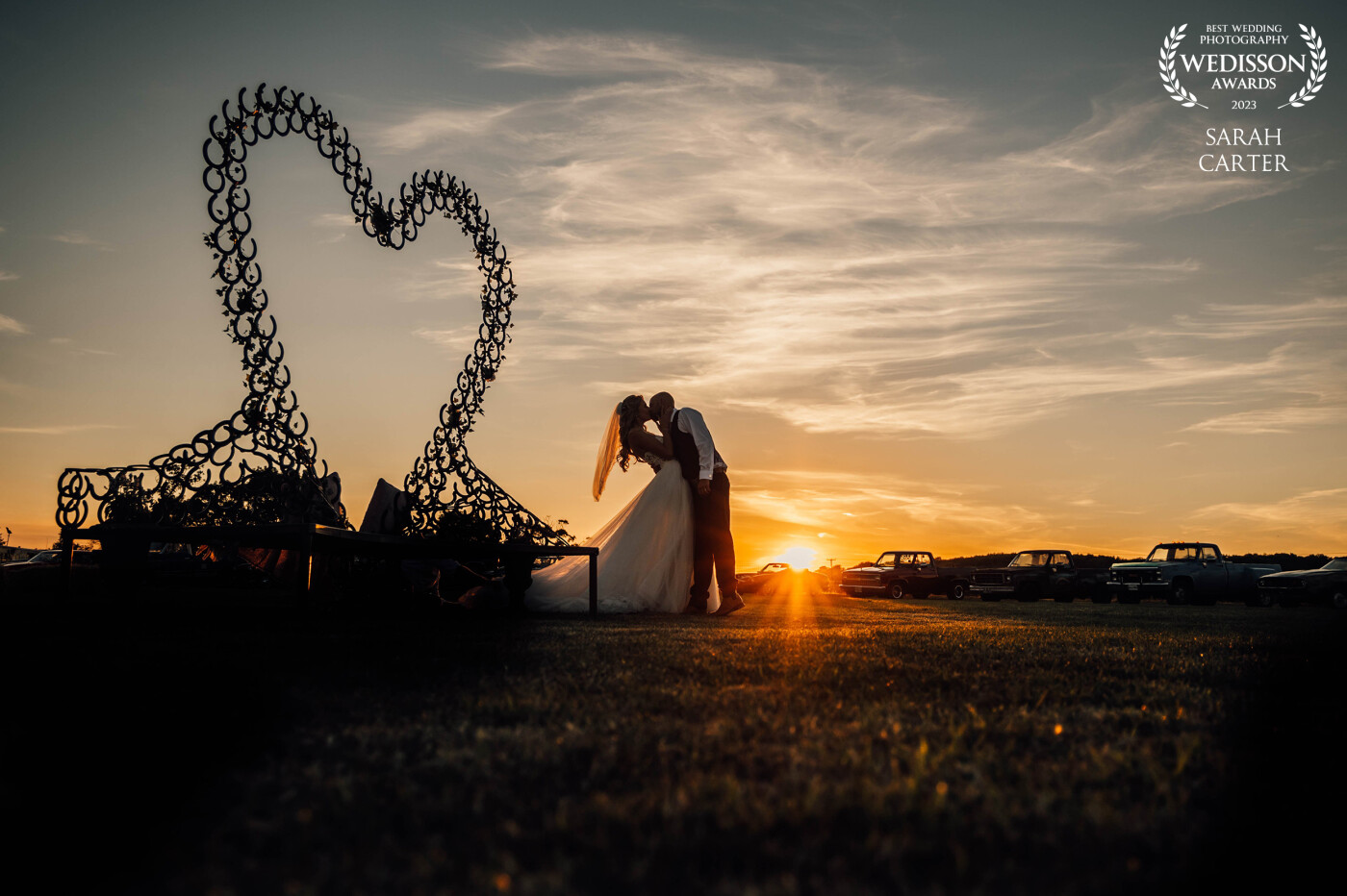 When I saw the heart made of horse shoes (the groom made this) I knew we had to get it in a photo. So we waited for sunset so we could get some nice silhouettes.