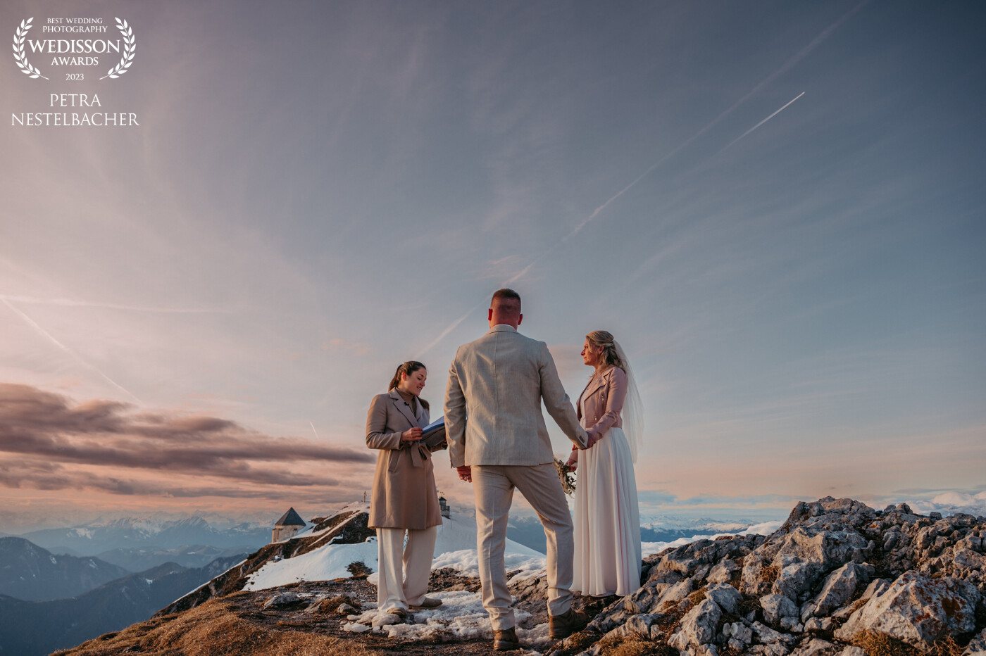 It was a wonderful elopement on the peak of an 2143m high mountain in Austria. The wedding ceremony took place during sunset and after a typical austrian dinner we spent the night in the mountain hut. The next day we had amazing fun going down the mountain with wodden sleds.