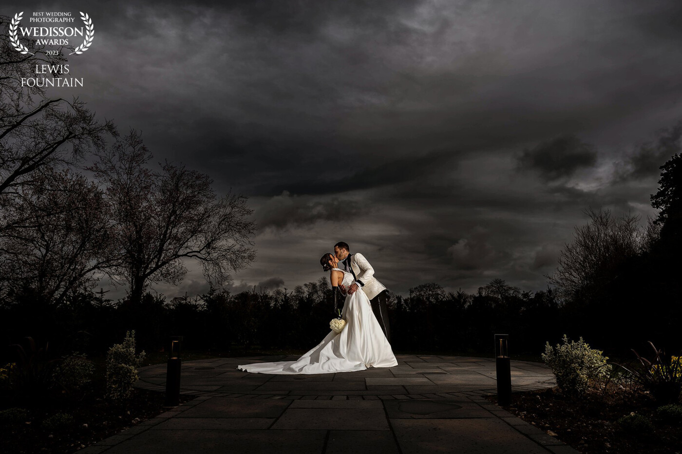A black & white themed wedding could only be held at Swynford Manor near Newmarket, and when the storm clouds rolled in we couldn’t resist taking our bride & groom out in to the gardens, for some dramatic shots utilising the early evening light and our strobes.