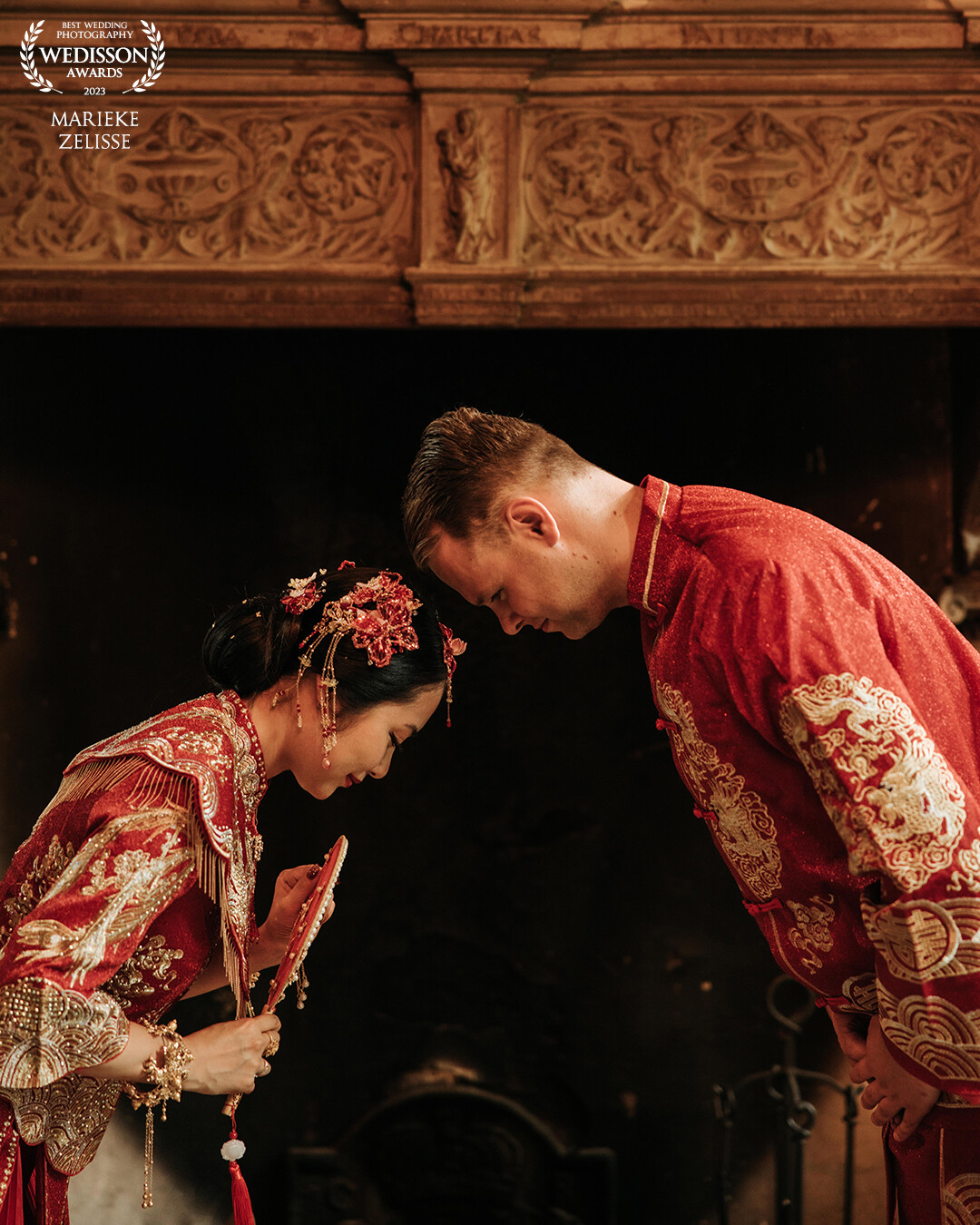 They wore a part of the wedding Chinese traditional clothes as a surprise for her mom. She flew over from China to The Netherlands.