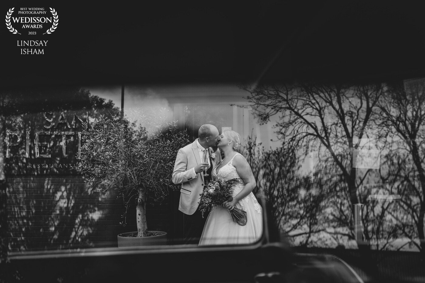 These two had just pulled up in their wedding car at their reception venue after saying their "I do's"!  I loved the reflections through their car window whilst they were enjoying a glass of bubbly.  Black & white makes it even more epic!  Captured at the fabulous San Pietro in Scunthorpe.