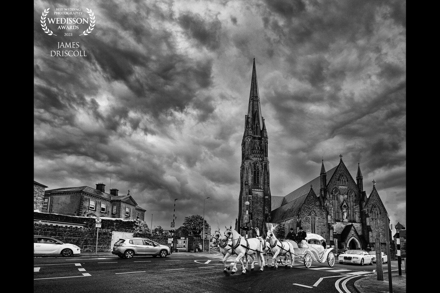 Bride and groom leaving a church in Limerick,,, could have removed the cars, but the expression on the ladies face in the car warranted in me leaving it...