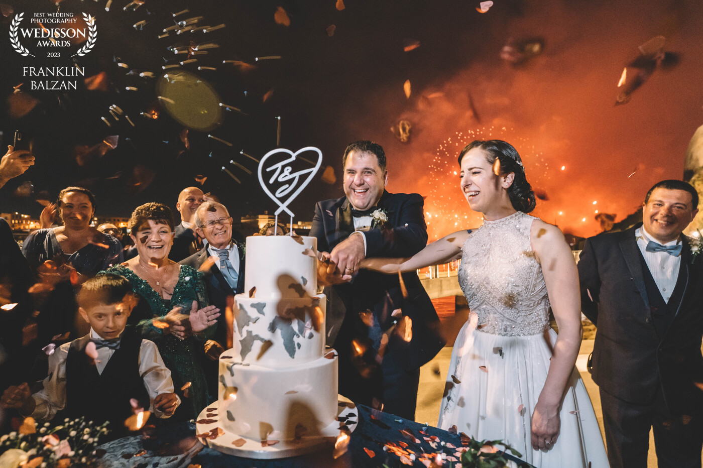 Amazing cutting of the cake with fireworks from behind!