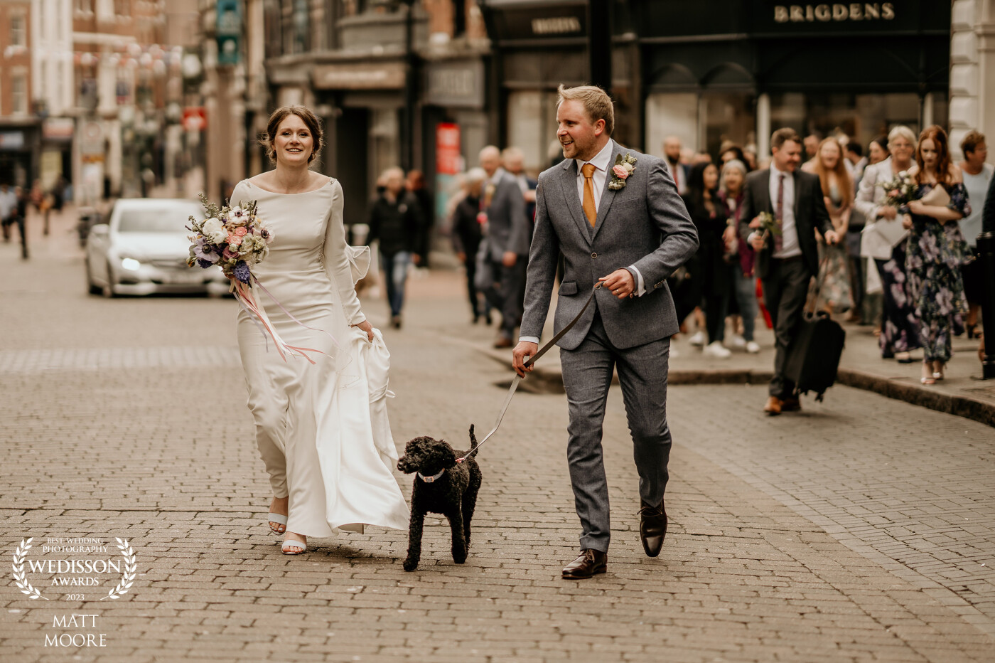 Urban weddings are just so cool. Having an extended gallery of people clapping and wowing you just gives you celebrity status. Orianne and Kristian smashed it with their walk through a busy Derby city centre