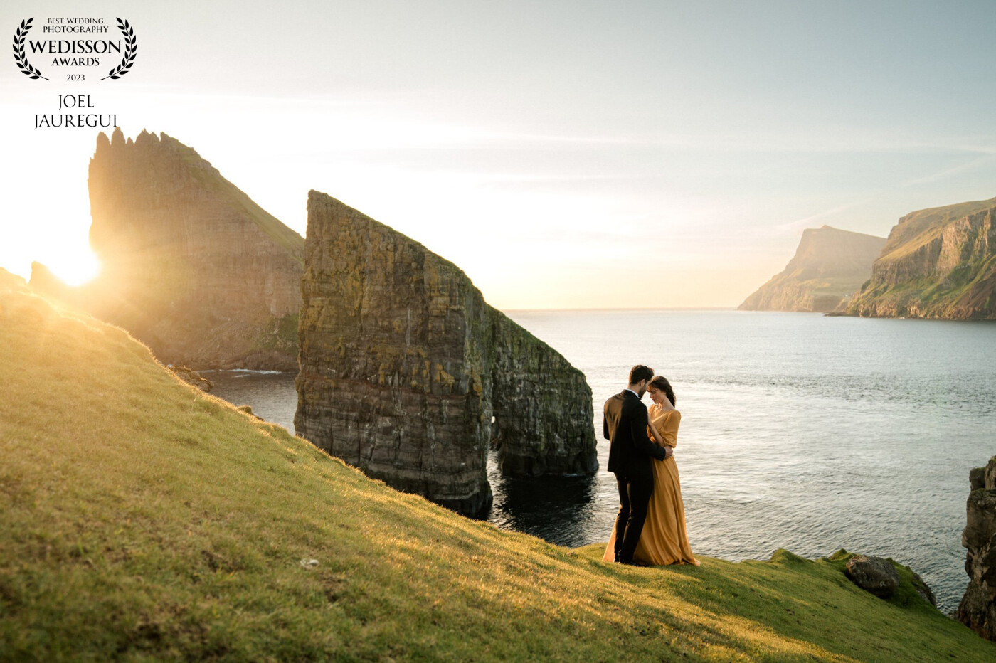 This was my first time in the Faroe Islands. Alahna and Victor came from London for this adventure elopement. There are two ways to get to this location, one is by hiking a long, long way, and the other way is by chartering a boat. We went with the latter. On the first day and first attempt, the water was too rough for the boat to dock at the drop-off safely, so we were forced to turn around. On day two, the attempt was a success, but then we had one heck of a hike to get to this vantage point, and the sun was setting quickly, so we had to move. All in all, I think it was a success. Special thanks to my friend Tyler; his knowledge and planning made this possible.