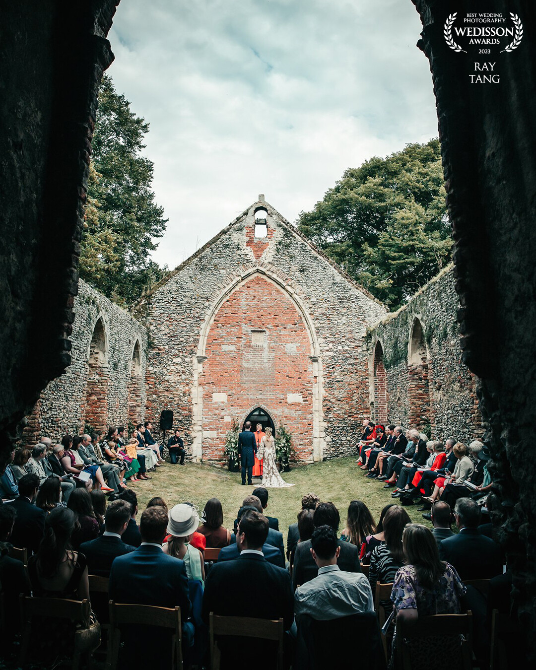 This beautiful couple chose a truly unique ceremony venue—a church with no roof!