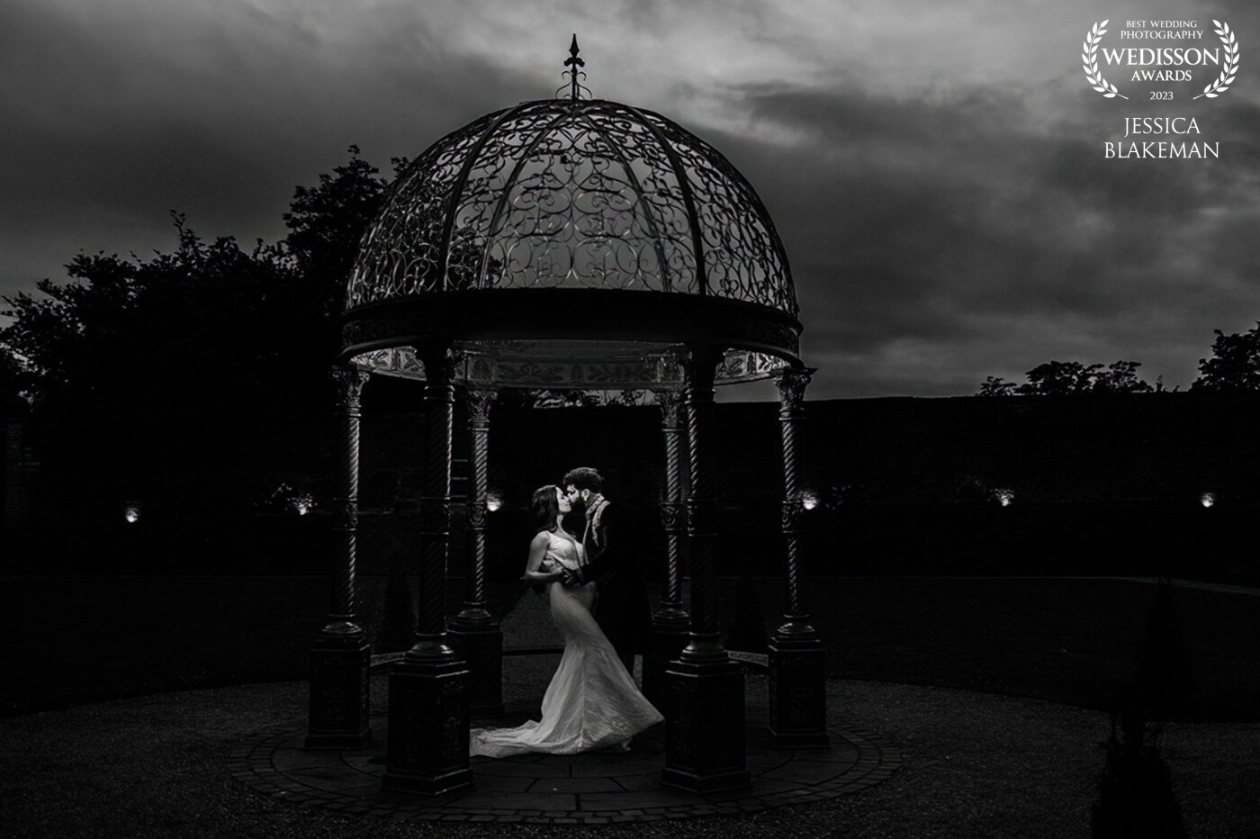 We were due to leave after the first dance but it was still light outside. I just knew I just had to wait for it to get a little darker to grab this shot. I'm so happy we stayed behind!