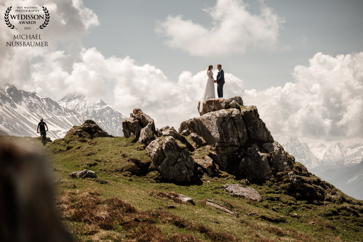 Sarah and Armando love the mountains. Just around the corner from where they live, on a beautiful cloudy day, we found this epic spot. After the first look, we took a few photos on this rock where cyclists crossed the path and congratulated the couple as they shred down the path.
