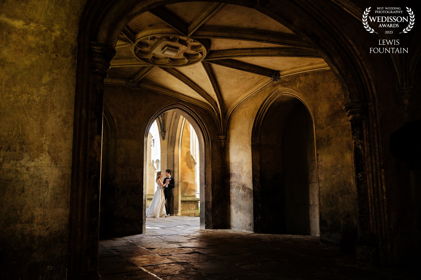 Barbara & Rupert’s wedding at St John’s College Cambridge was a day  they’ll never forget. <br />
<br />
This shot deep within the college architecture just jumped out at us with the beautiful contrasting light; and they loved it ❤️