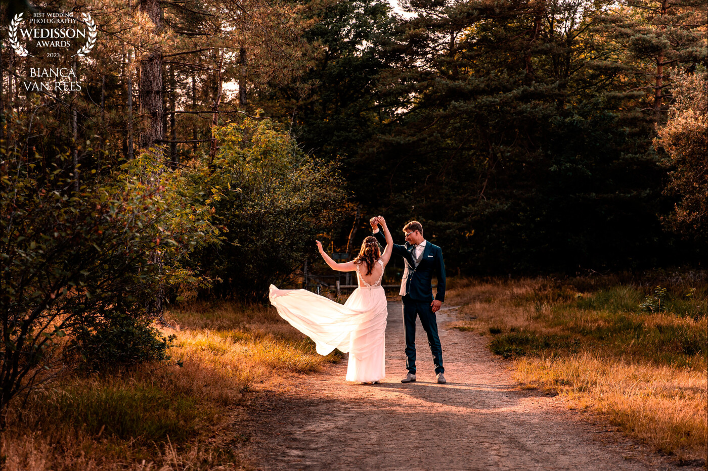We planned the wedding reportage in the nearby forest in the evening after dinner, and we were gifted with a beautiful sun that day. The forest created a beautiful display of shadows and a ray of sunlight, in which I positioned the couple to create this fairy tale like image.