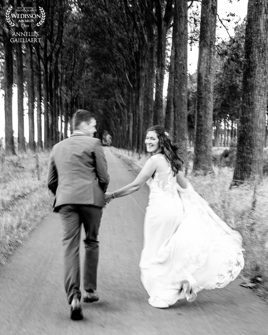 Run away, quite literally. Because it was raining when we did couple pictures, we decided to skip part of the reception when this picture was made
