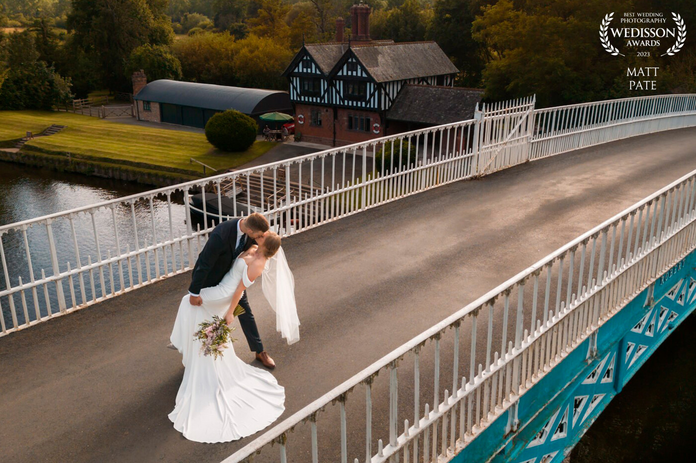 An absolutely stunning location for photographs. I was so pleased when Emma & Rik suggested this location for photographs, after their wedding at Chester Town Hall.<br />
This beautiful iron bridge over the River Dee, was perfect for this image taken using my drone.