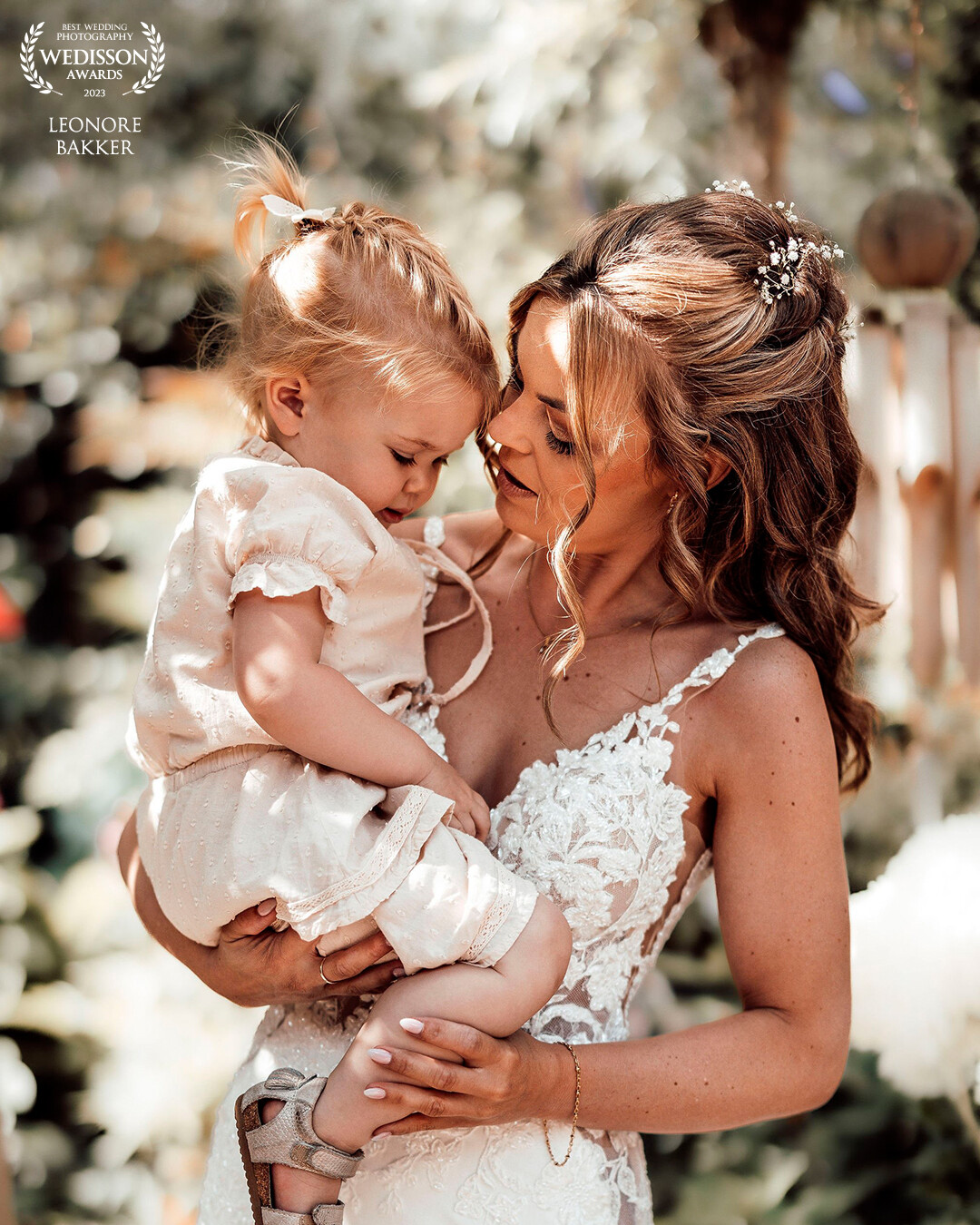 A Mother's Love…  Just moments before exchanging vows, our beautiful bride steals a heartwarming kiss from her little princess