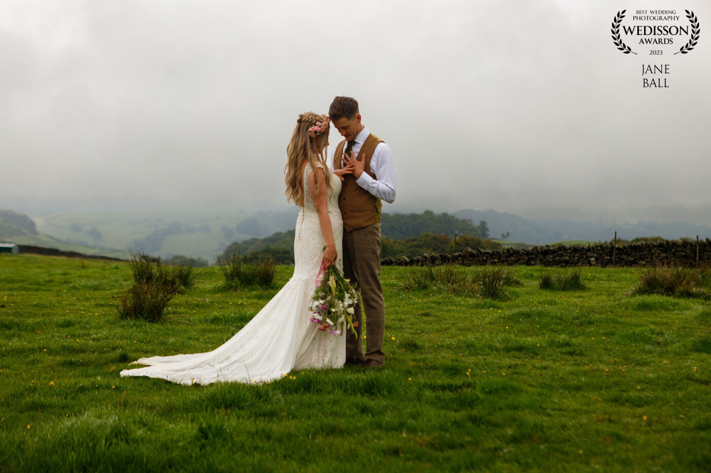 Taken at the Tarn at Fairbank Barn in the English Lake District, this photograph was one that I knew my couple wanted above all others. It was a really special few minutes were they could just relax and enjoy a bit of quiet "them" time after the ceremony. We had waited until the rain had stopped before going up to the Tarn. My bride didn't bother one bit that her dress would get wet and very dirty. She just wanted to be with her new husband at a place she loved.