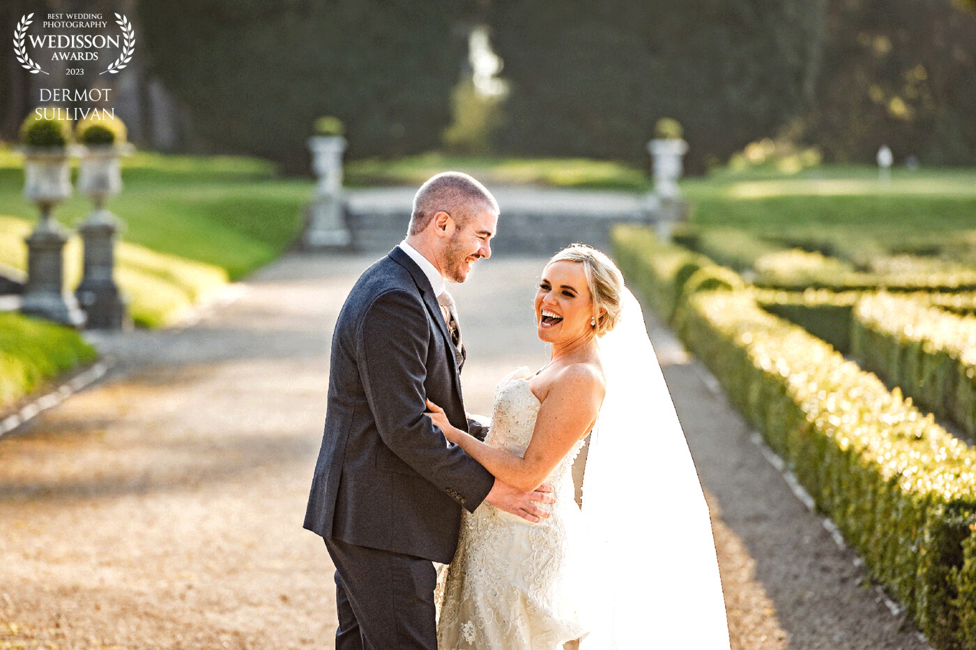 This photograph was taken at Castlemartyr Hotel in Cork, on a lovely sunny afternoon in March. The location was beautiful and my couple were really great to work with. I positioned them with the sun behind and shot from a slightly raised position on some steps.