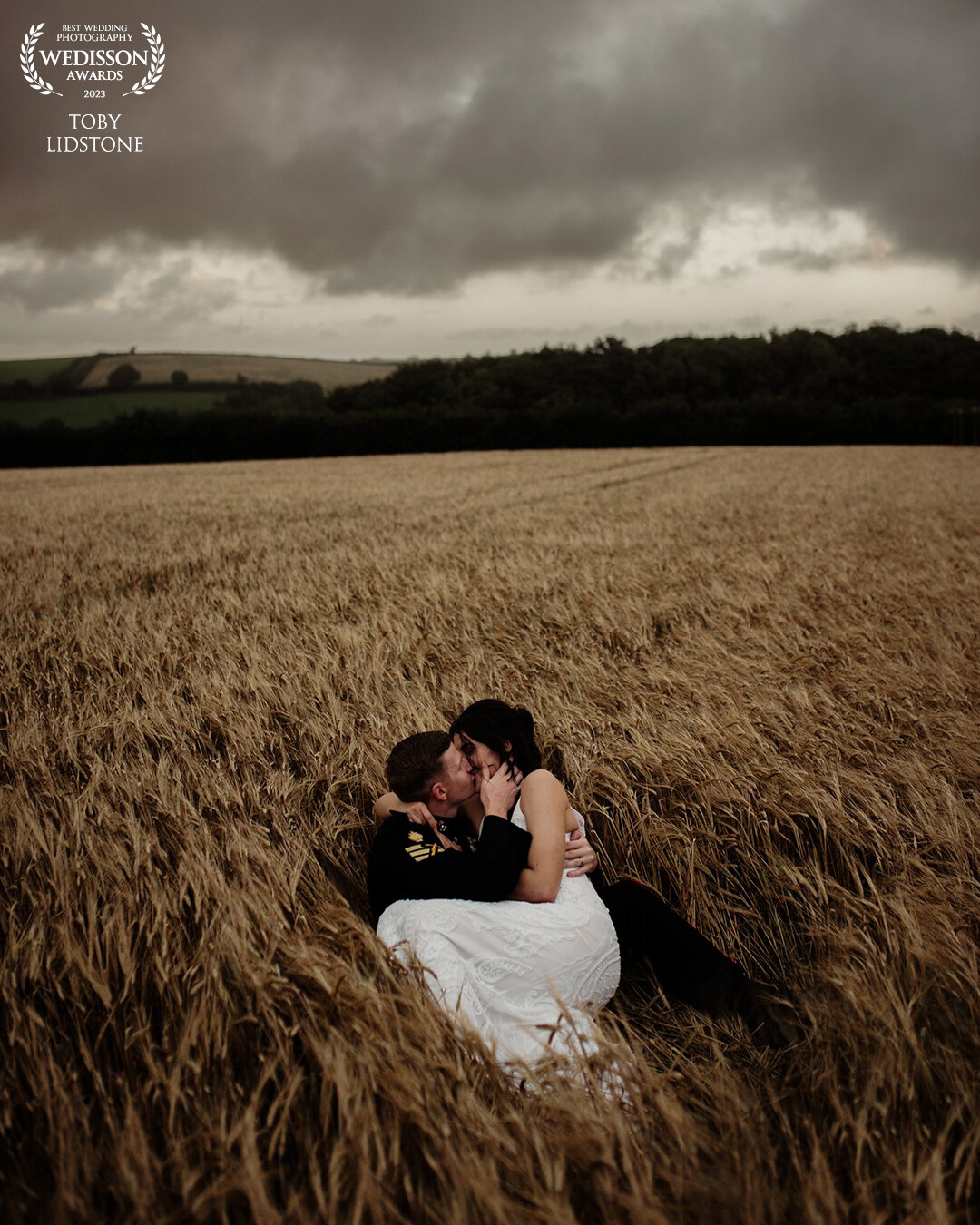 I love this shot of Ryan & Amy having a kiss in her family's corn field.
