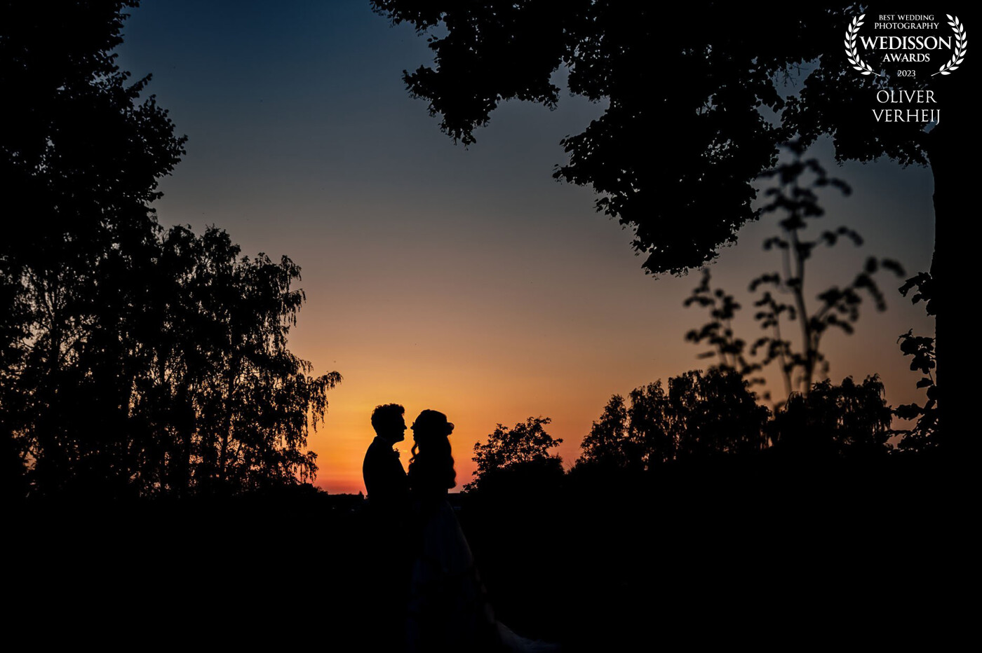 A lovely couple during twilight. I always try to take the bride and groom for a wallk during the golden hour to make a silhouette photo. Not only are the photos fantastic, it's always nice to have an intimite moment together during an otherwise busy day.