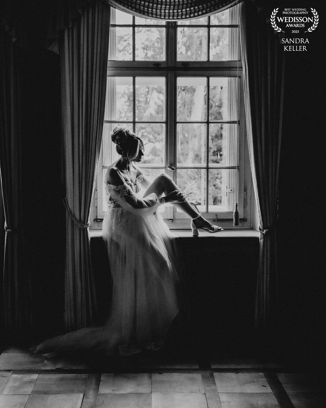 I saw this beautiful window light and had to sit her there to put her shoes on. For me it looks really peaceful and elegant.