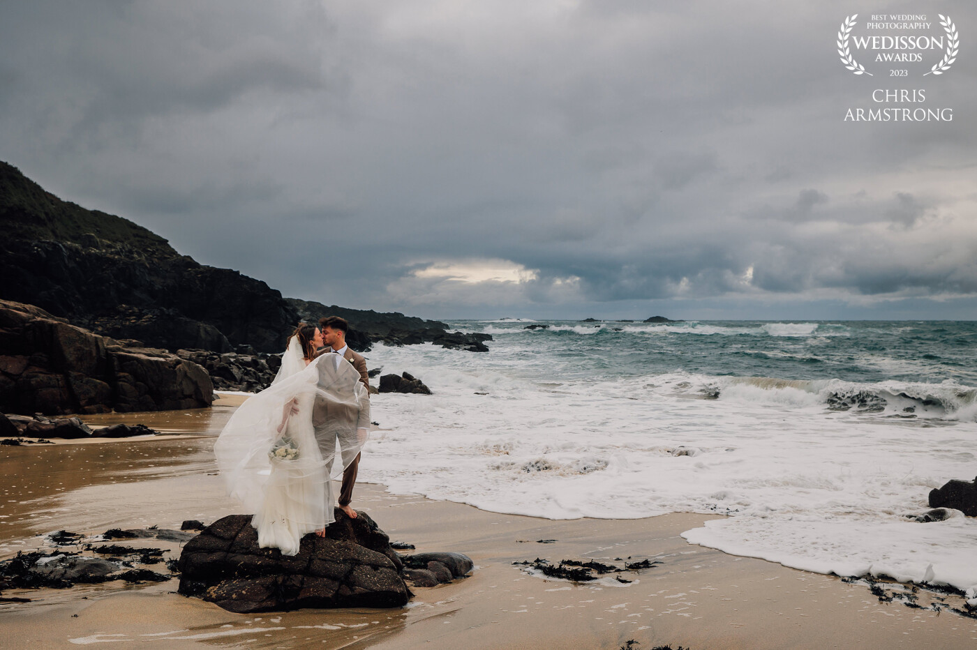 Lauren and Henry, stealing a moment together as we watched a rain storm rolling in across the sea.