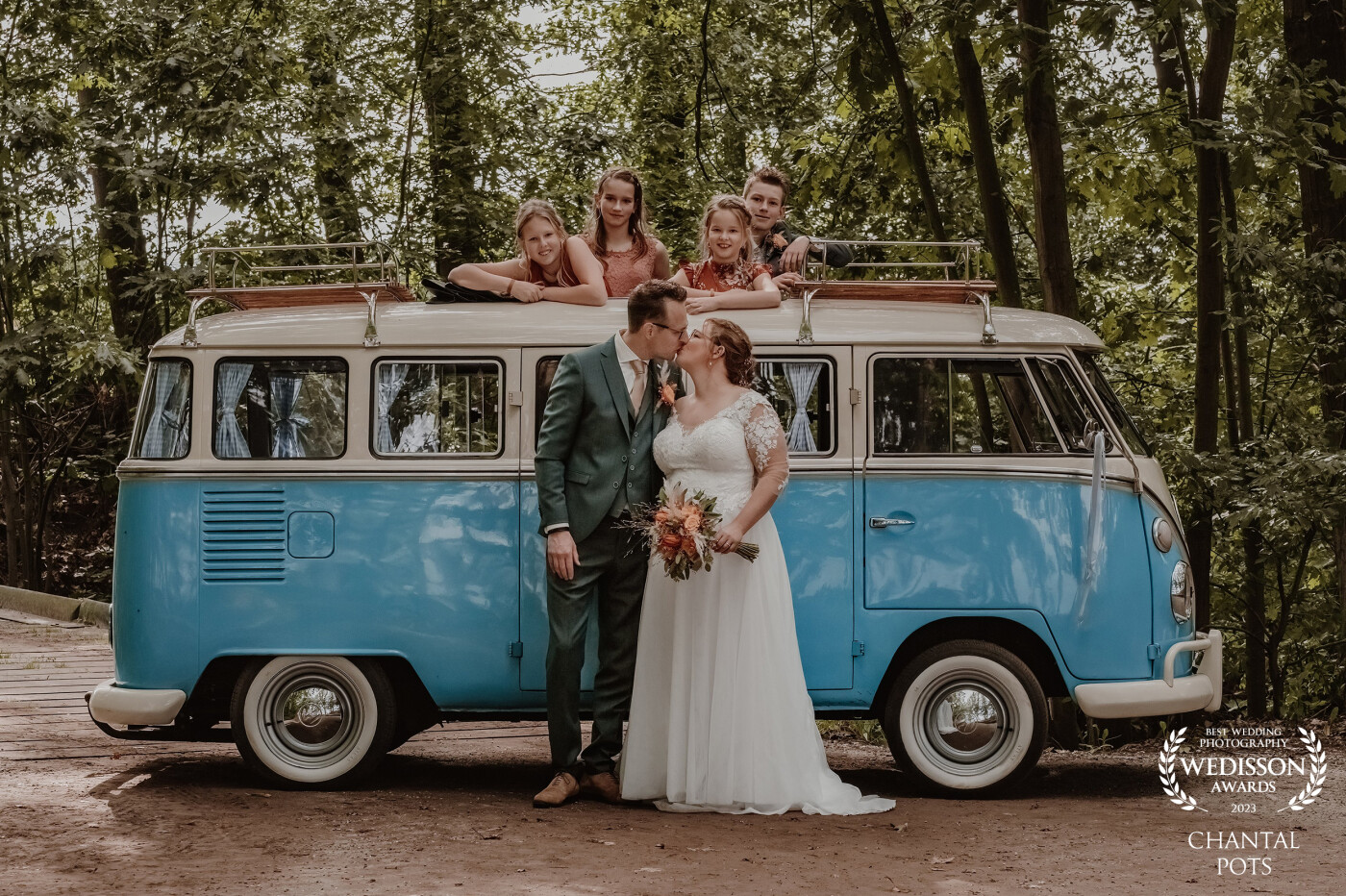 This beautiful couple chose to go to their wedding location in a Volkswagen T2. Of course we stopped along the way to take pictures with their children in this amazing vehicle.