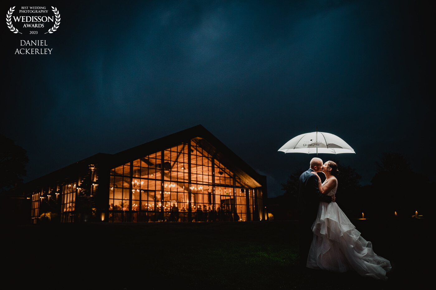I had the immense pleasure of being asked by fellow photographer Louise to capture her wedding to Paul at the stunning Botley Hill Barn, however the weather was awful all day, but it did make for a really stunning moody evening sky which we made the most of for this nighttime portrait!