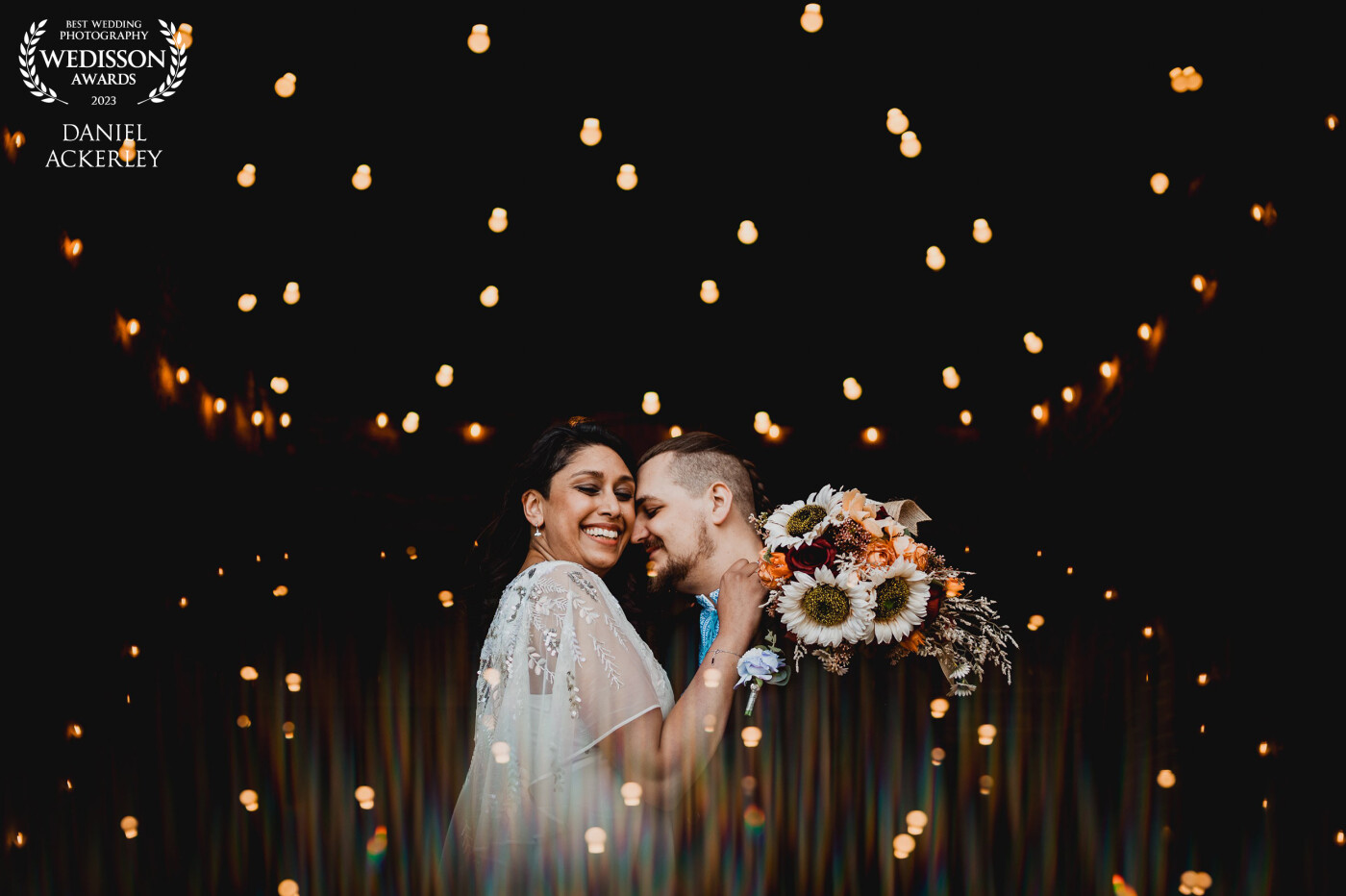 Sabrina is an old friend of mine and a fellow photographer, so I was quite nervous about capturing her wedding to Phil up in Manchester, the venue had a wonderful barn full of ceiling lights that I thought would make a great reflected portrait so I used my phone to bounce the reflection back into the photo!